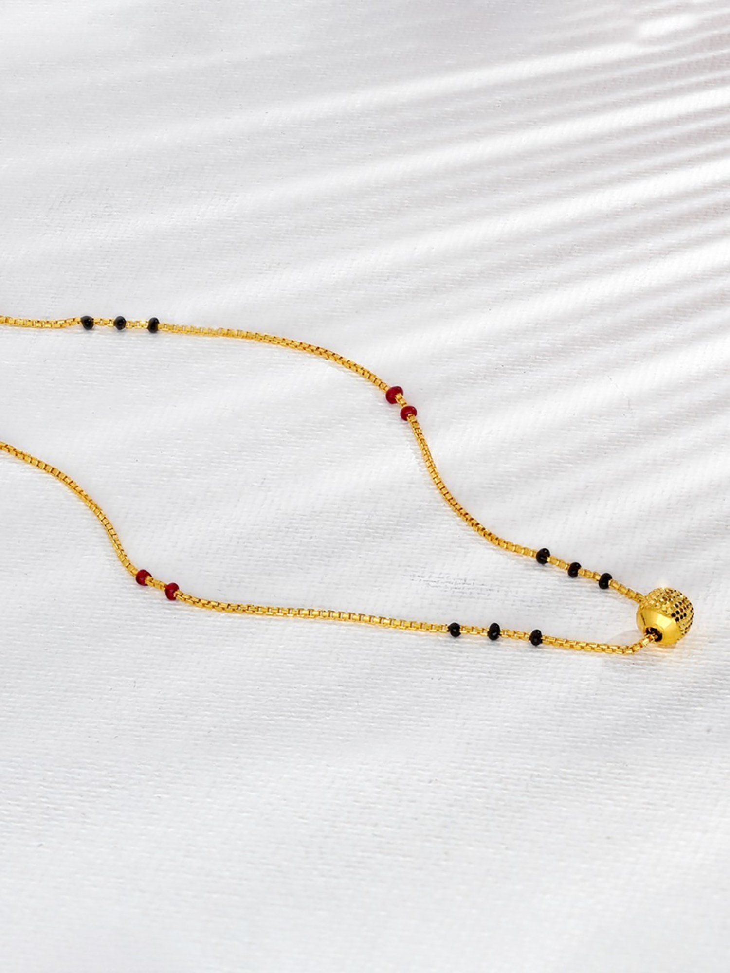 P.N.Gadgil Jewellers 22k Bedazzling Ball Gold Mangalsutra