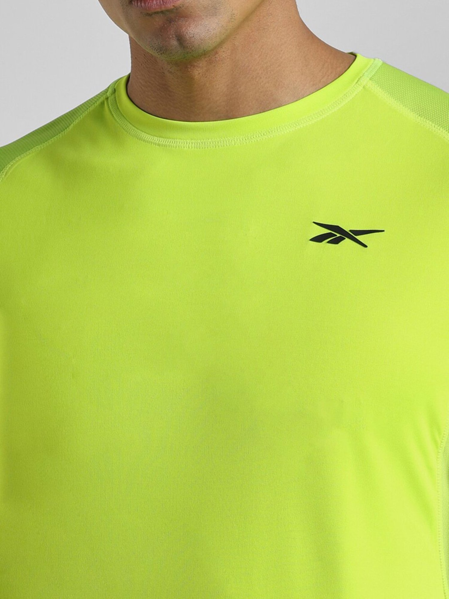 Reebok Green Polyester Regular Fit Solid T Shirt