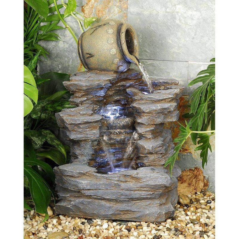 Spilling Jug Cascading Garden Fountain - Acorn Hollow