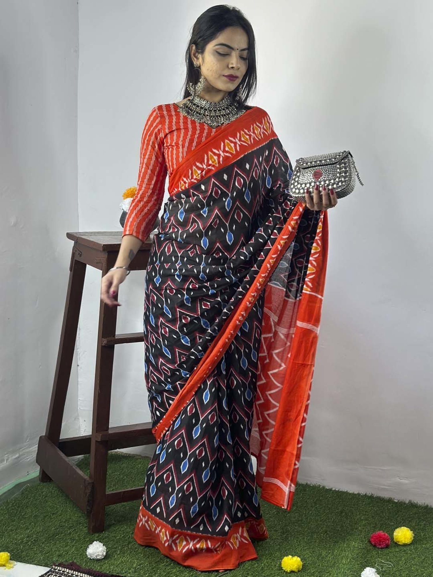 Saree Mall Black & Orange Cotton Printed Saree With Unstitched Blouse