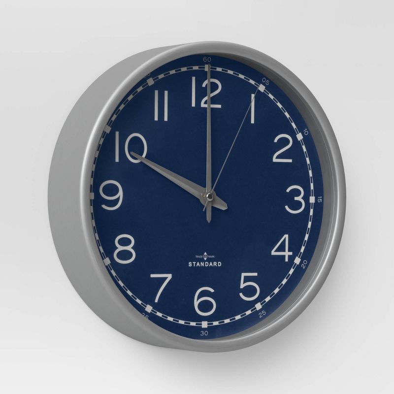 20" Metal Cut Out Roman Numeral Wall Clock Black - Patton Wall Decor