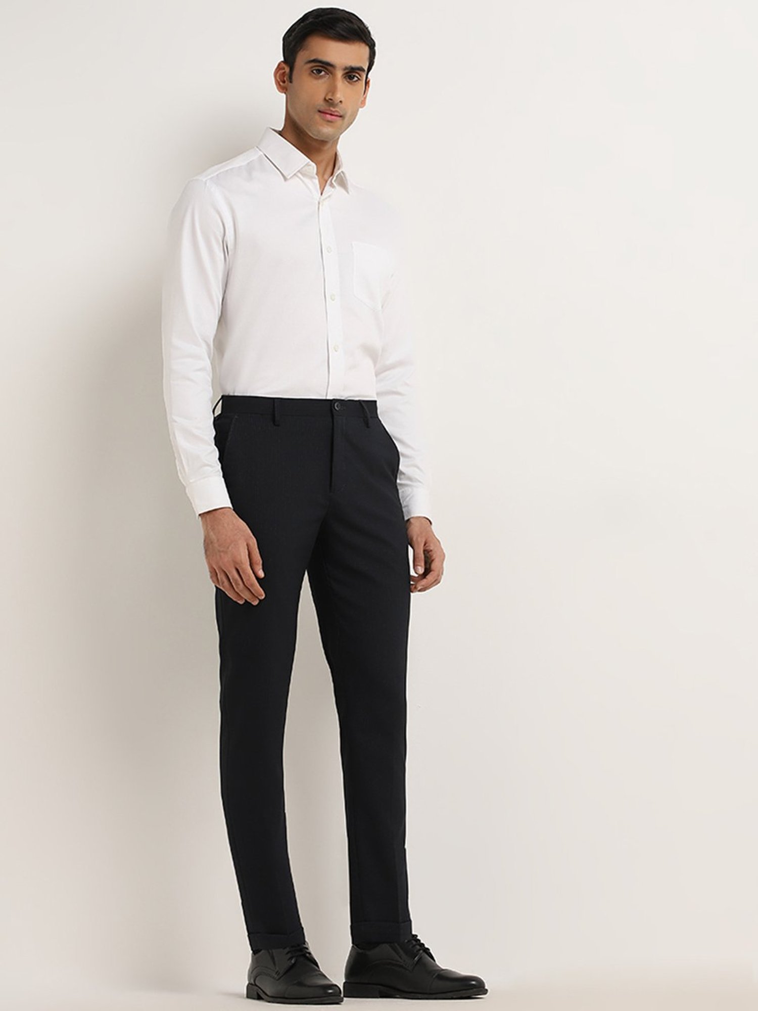 WES Formals by Westside Black Pinstripe-Detailed Carrot-Fit Trousers