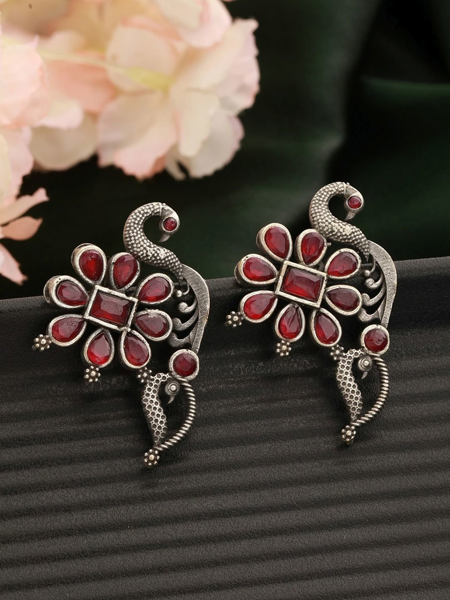 Aatmana Silver-Plated & Red Stone-Studded Oxidized Peacock Shaped Stud Earrings