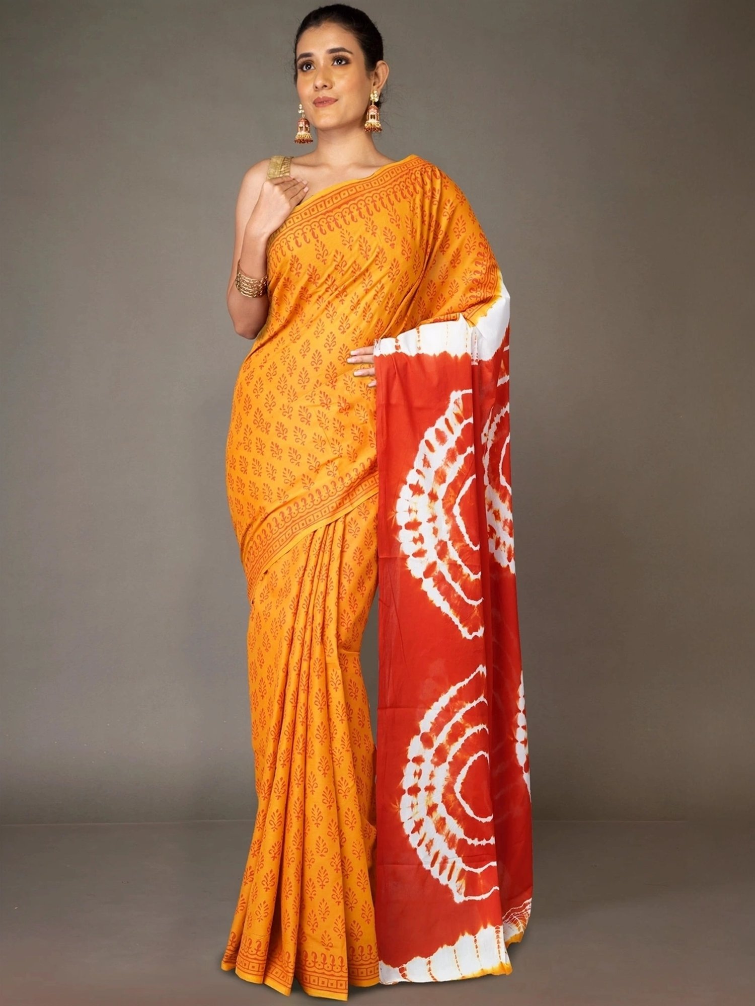 Unnati Silks Yellow & Red Cotton Printed Saree With Unstitched Blouse