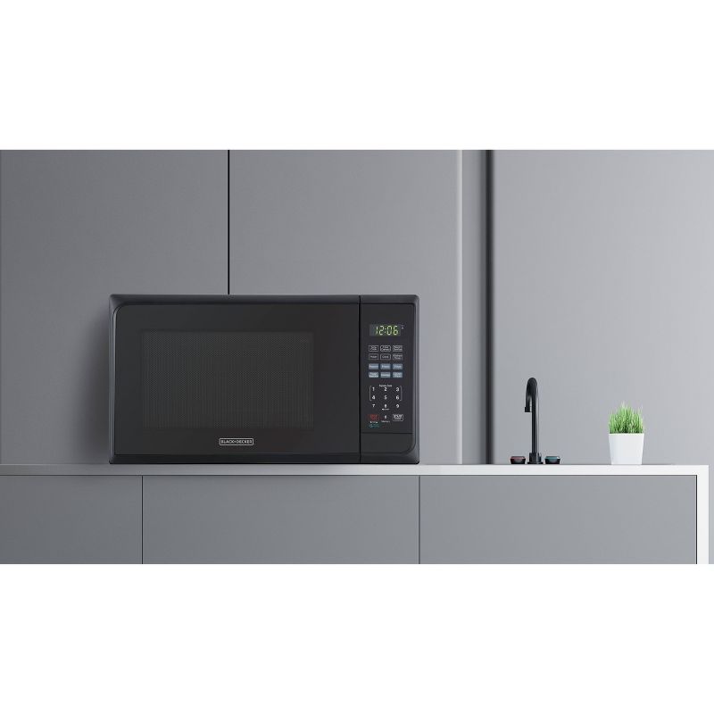 BLACK+DECKER 1.1 cu ft 1000W Microwave Oven - Stainless Steel Black