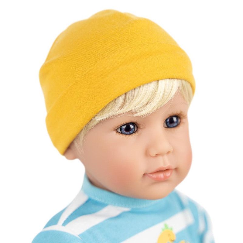 Adora Toddler Doll "Dino Boy" in Striped and Dino print top, coordinating Dino Pants and Yellow Sneakers