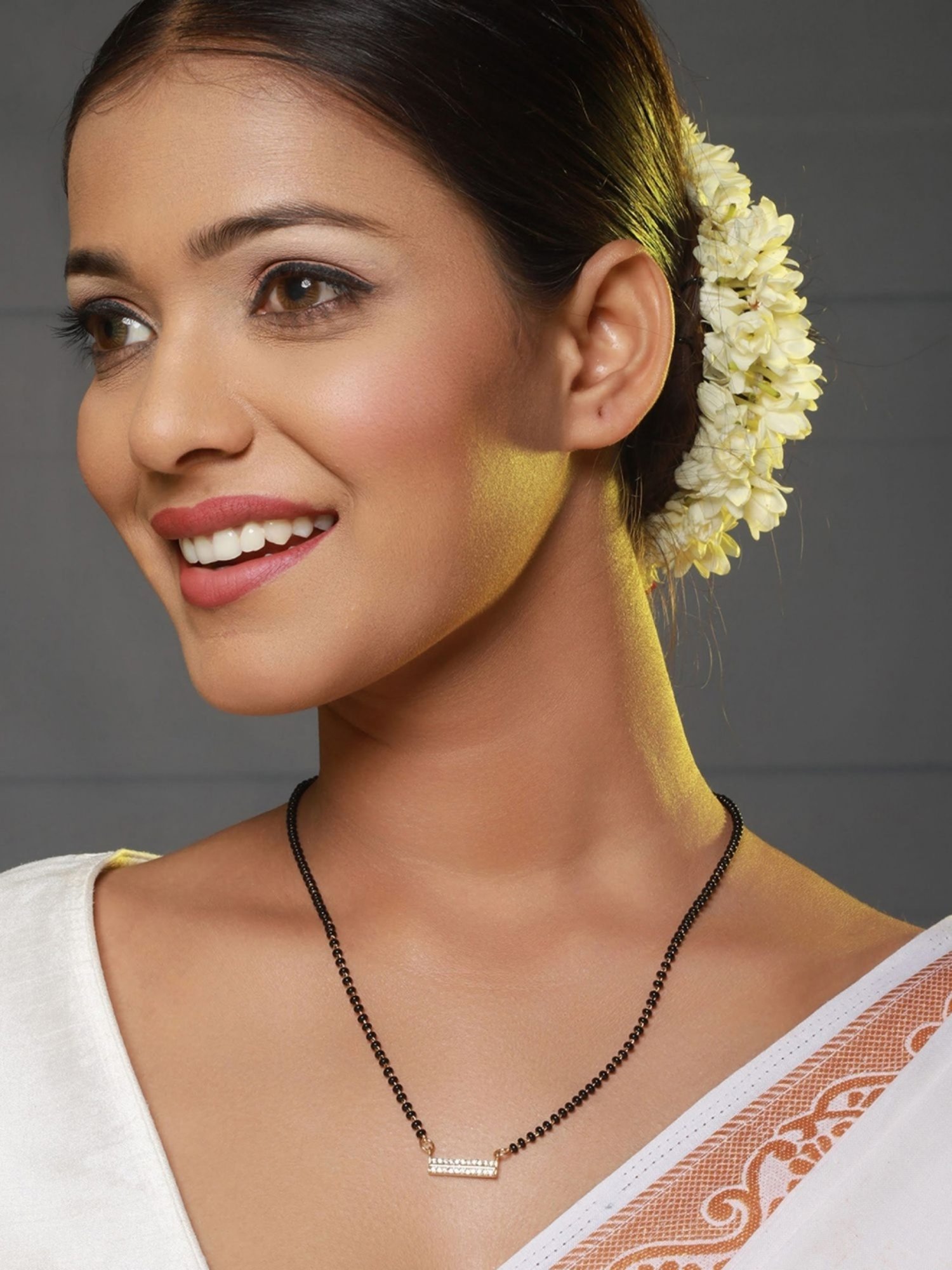 Aatmana Black Gold-Plated AD-Studded & Beaded Mangalsutra for Women