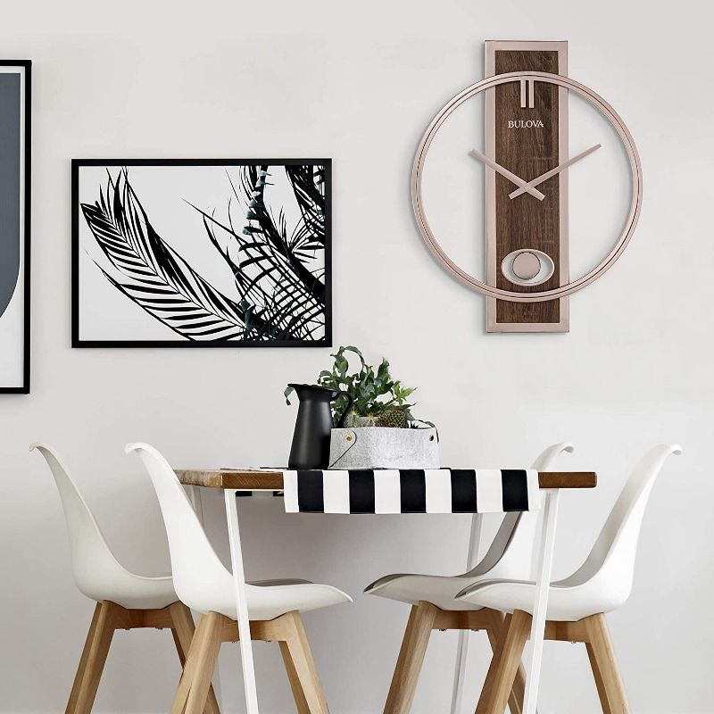 Bulova C4117 Phoenix Minimalist Metal Slow Swing Pendulum Wall Clock with Walnut Finish Center Panel and Metal Case and Hands, Champagne