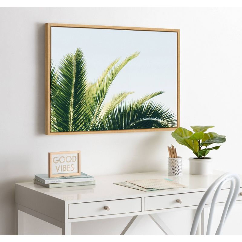 23" x 33" Sylvie Tropical Palm Under Blue Sky Framed Canvas by Amy Peterson Natural - Kate and Laurel
