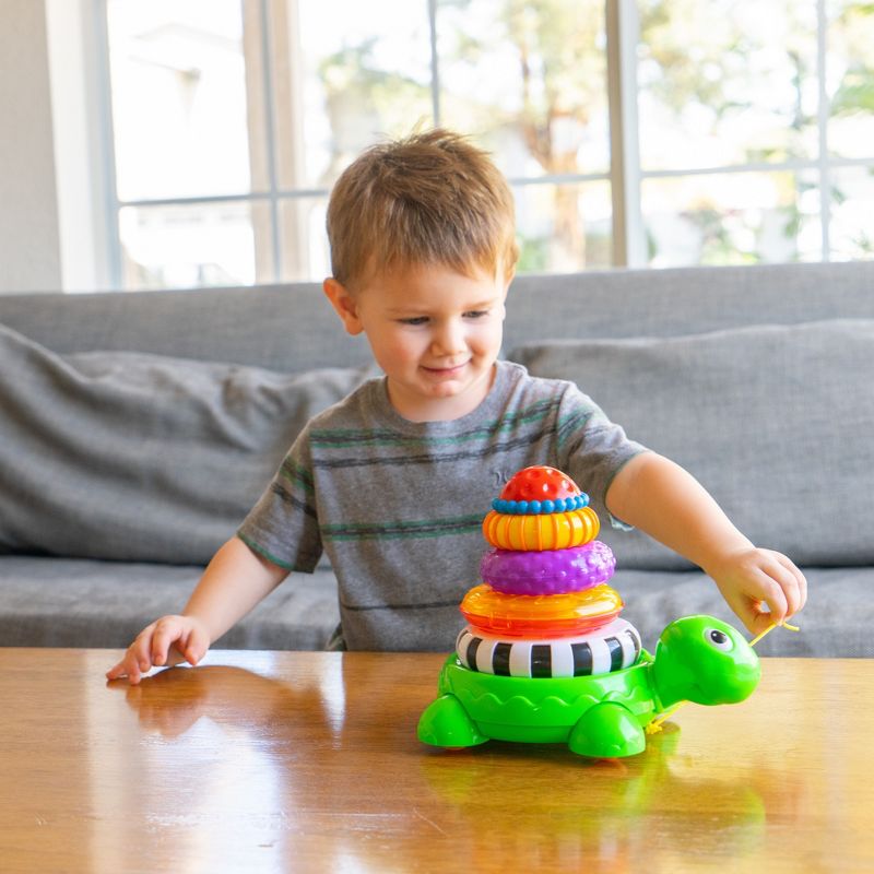The Learning Journey Pull Along Stacking Turtle includes 5 stacking rings