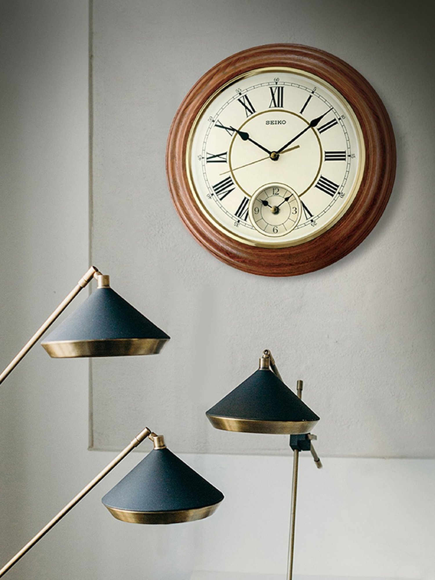 SEIKO classic black plastic wall clock with sweep movement