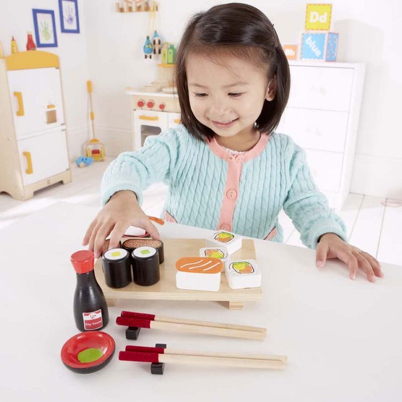 Hape E3130 Sushi Selection Kids Wooden Pretend Kitchen Play Food and Accessories Set with Sushi Rolls, Chopsticks, Bowls, Soy Sauce, and Serving Board