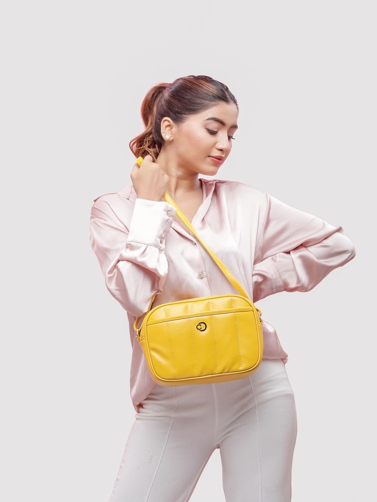 Caprese Poppy Fawn Faux Leather Quilted Sling Handbag