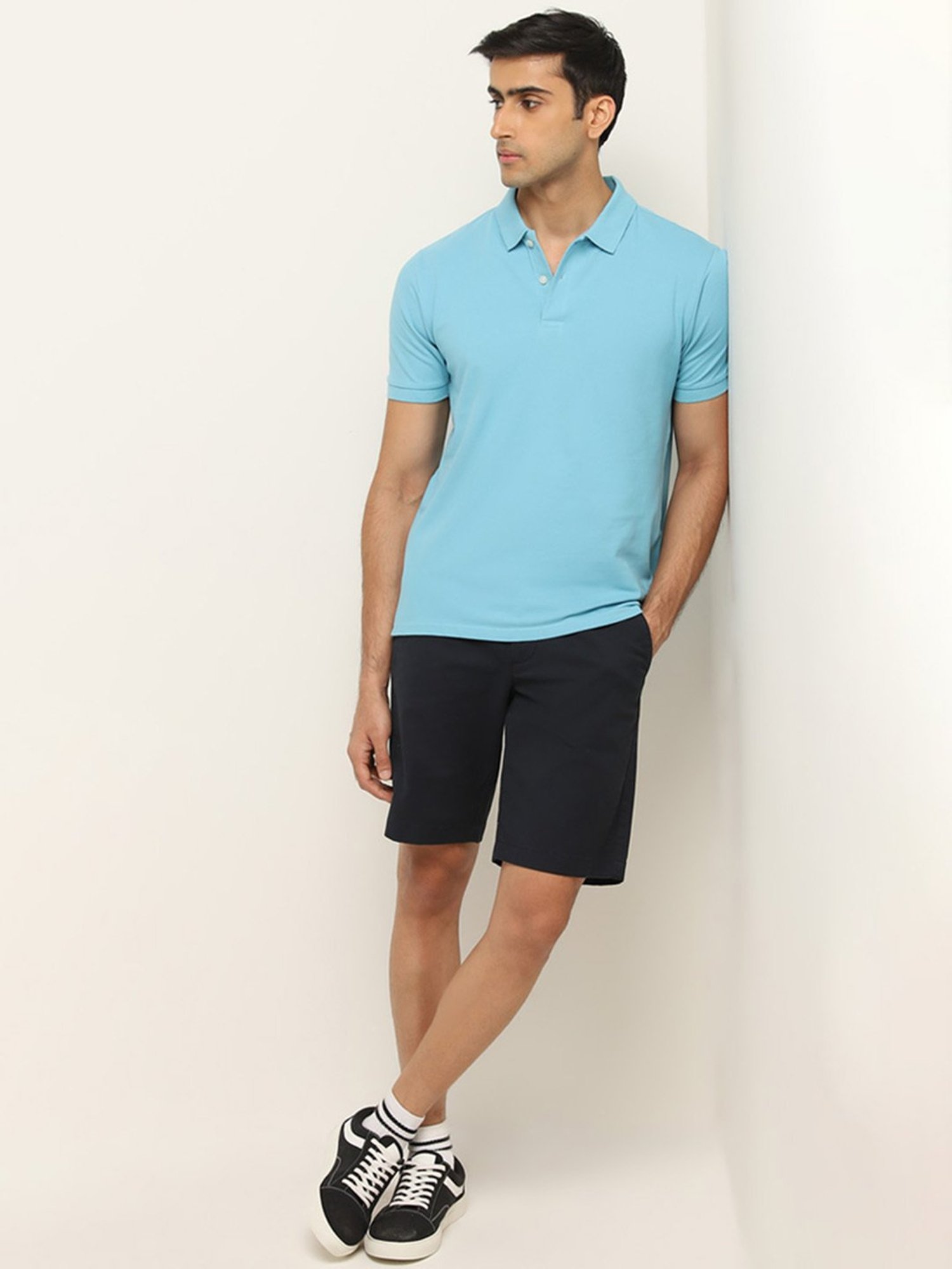 WES Casuals by Westside Blue Solid Slim Fit Polo T-Shirt