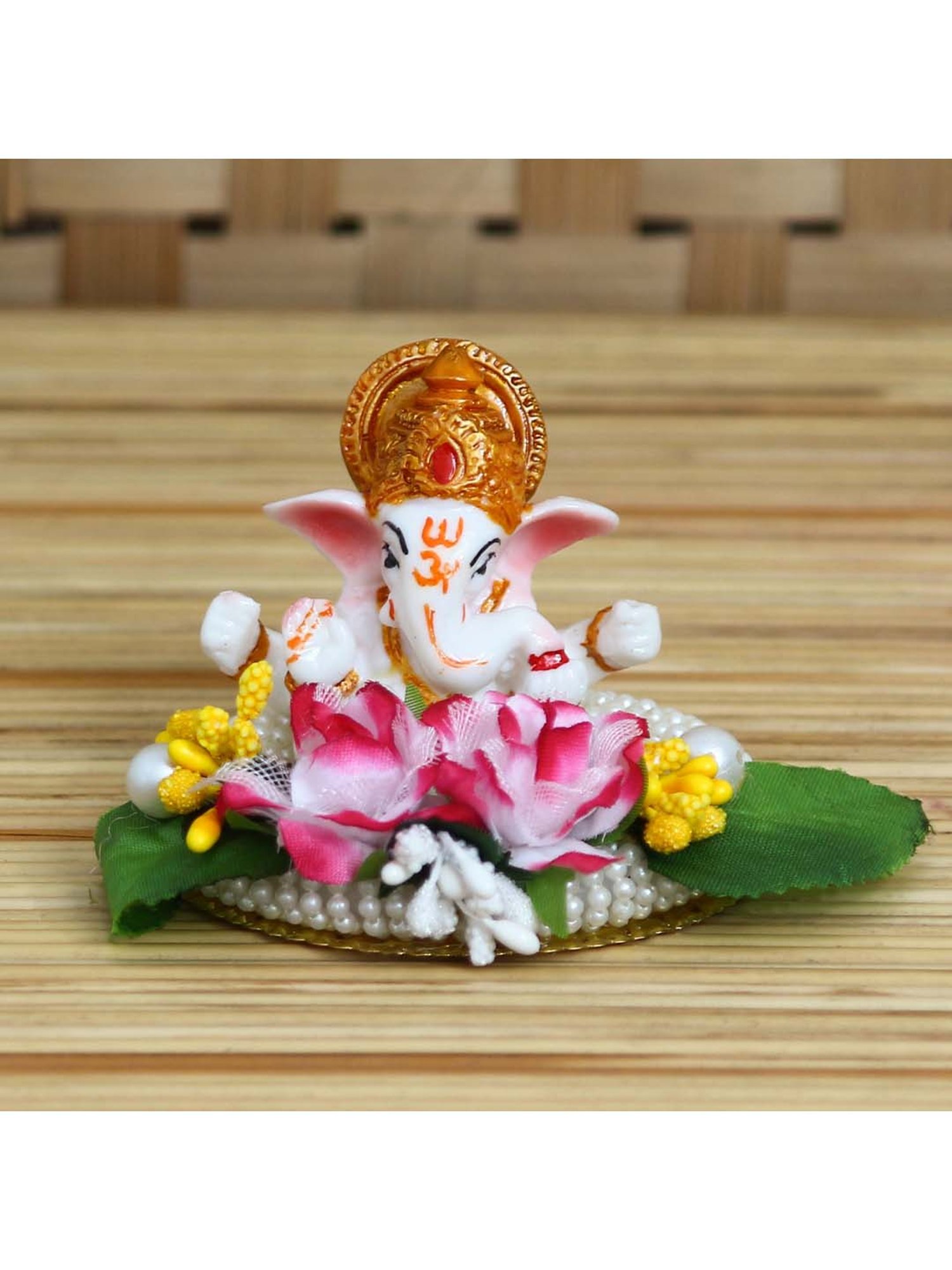 eCraftIndia Lord Ganesha Idol on Decorative Handcrafted Plate with Colorful Flowers and Leaf