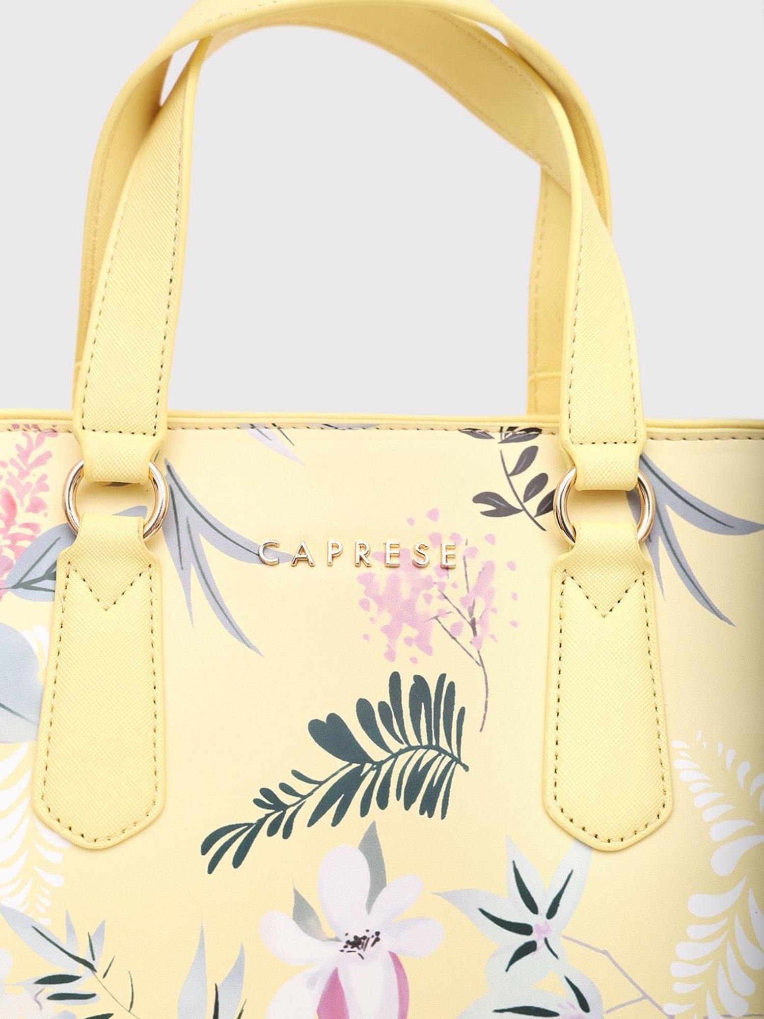 Caprese Gemma Yellow Faux Leather Floral Handbag