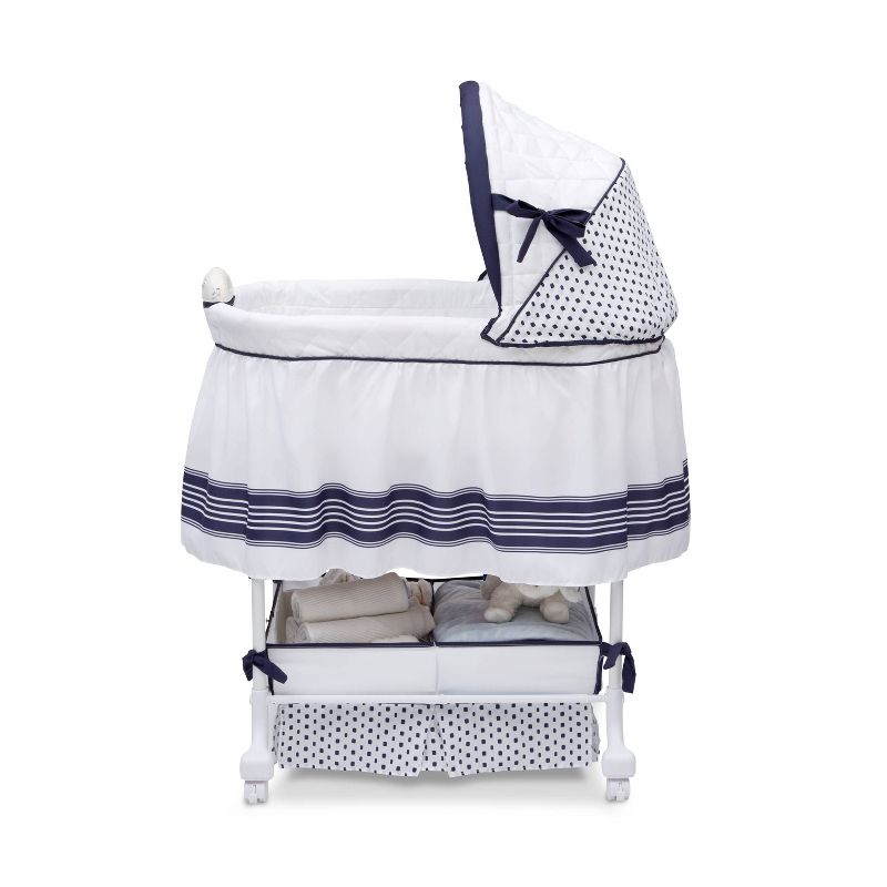 Delta Children Smooth Glide Bassinet - Marina