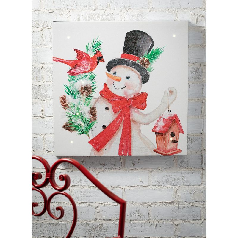 Sullivans LED Snowman Canvas Wall Decor 20"H Multicolored