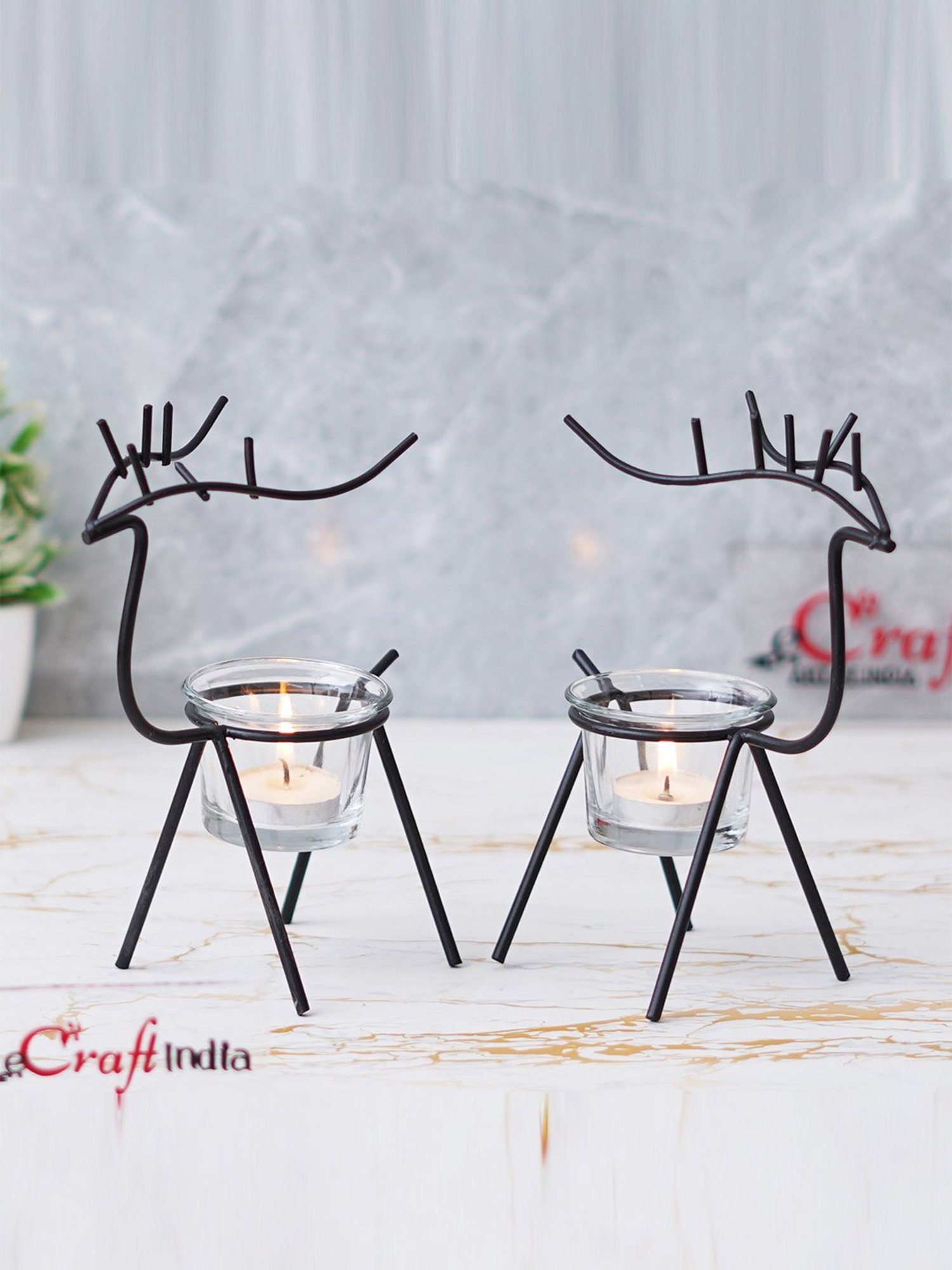eCraftIndia Solid Metal Deer Shape Tea Light Candle Holders - Set of 2