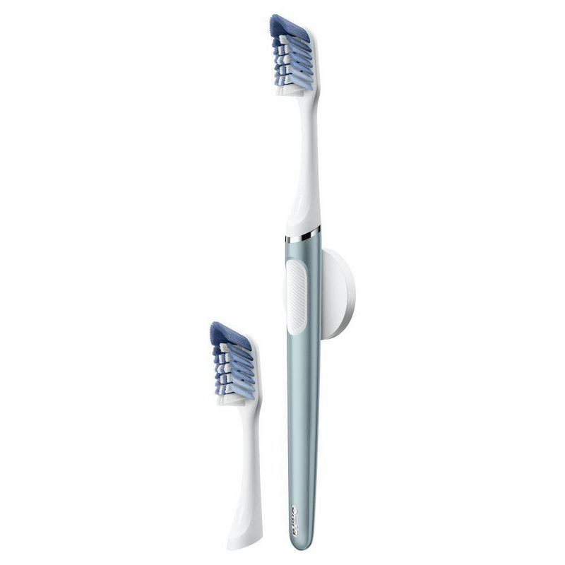 Oral-B Clic Toothbrush - Aqua with 2 Replaceable Brush Heads and Magnetic Brush Mount