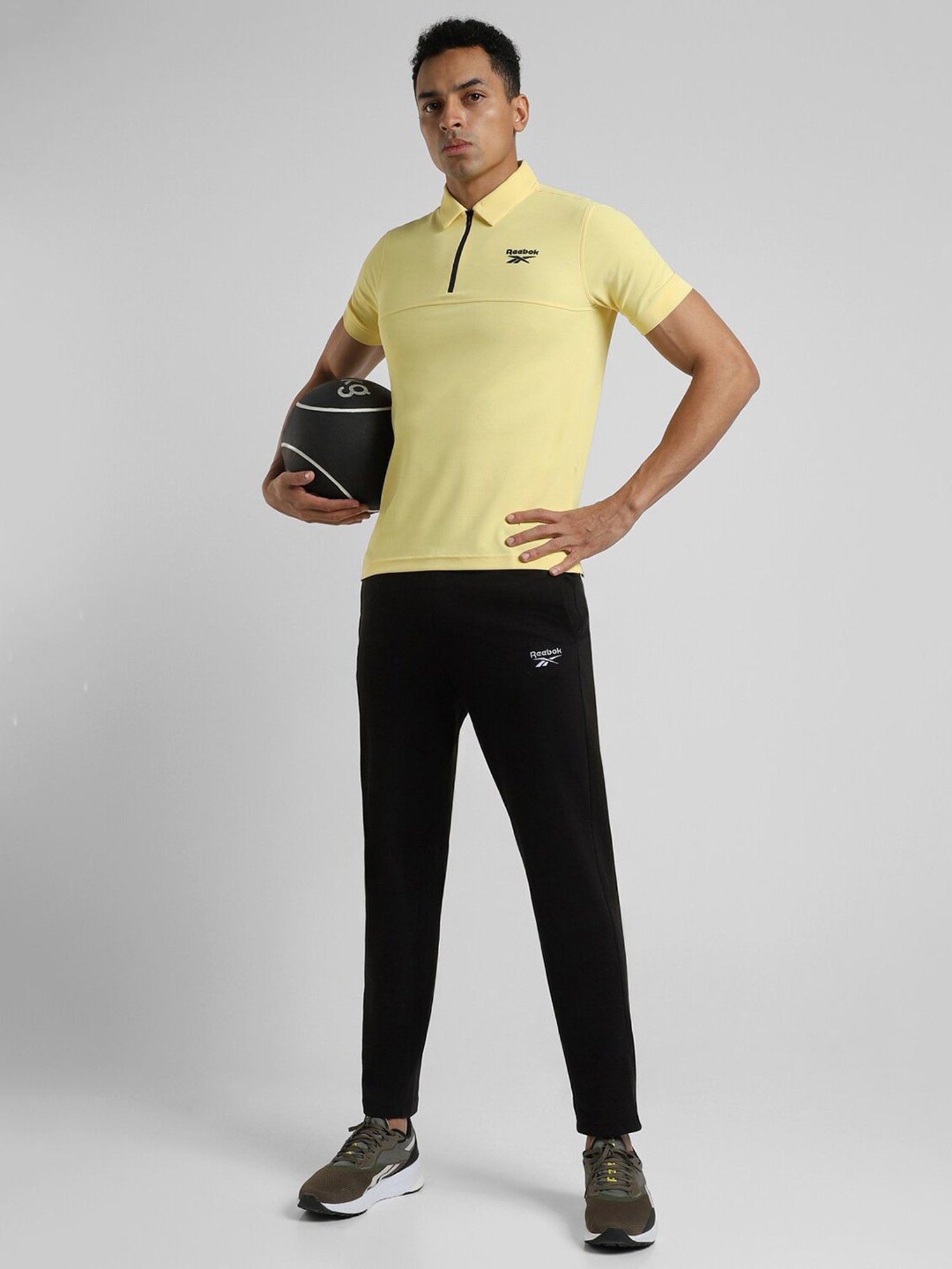 Reebok Yellow Polyester Slim Fit Solid Polo T-Shirt