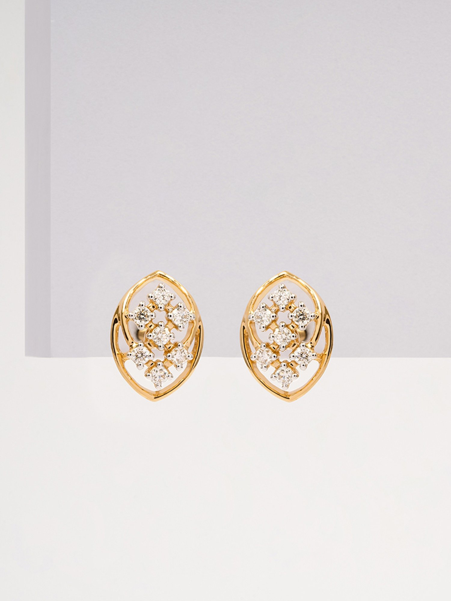 P.N.Gadgil Jewellers 14k Gold Twinkling Twist Stud Diamond Earrings For Women