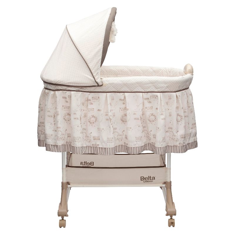 Simmons Kids' Silent Auto Gliding Deluxe Bassinet - Embossed Paisley
