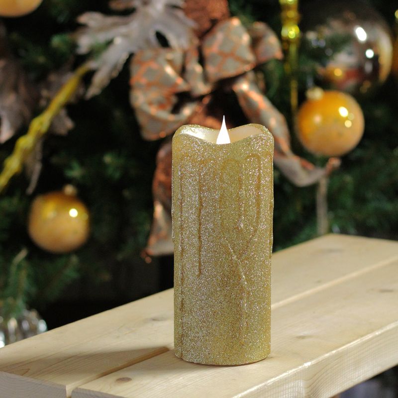 Melrose 7" Glittered Flameless LED Lighted Christmas Pillar Candle with Moving Flame - Gold
