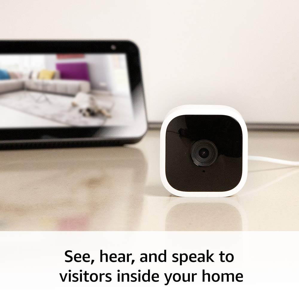 Blink Mini - Compact indoor plug-in smart security camera - Works with Alexa [1080 HD/Night Vision/Motion Detection/Two-Way Audio]