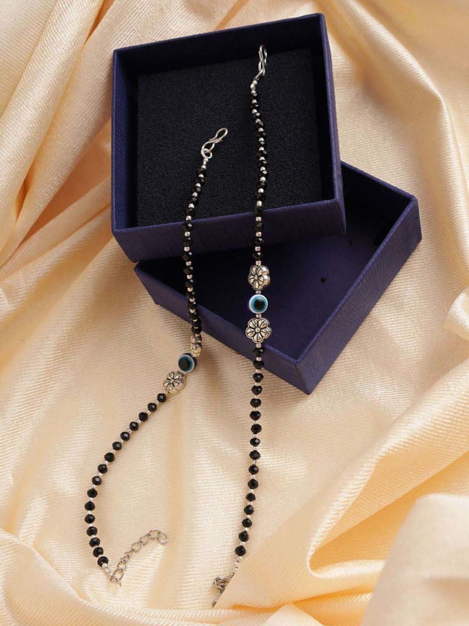 Aatmana Silver-Plated & Black Beaded Handcrafted Flower Anklets - Set of 2