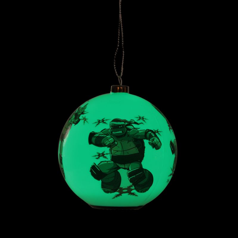 Carlton Cards 3.25" Heirloom LED Teenage Mutant Ninja Turles Ball Christmas Ornament - White/Green