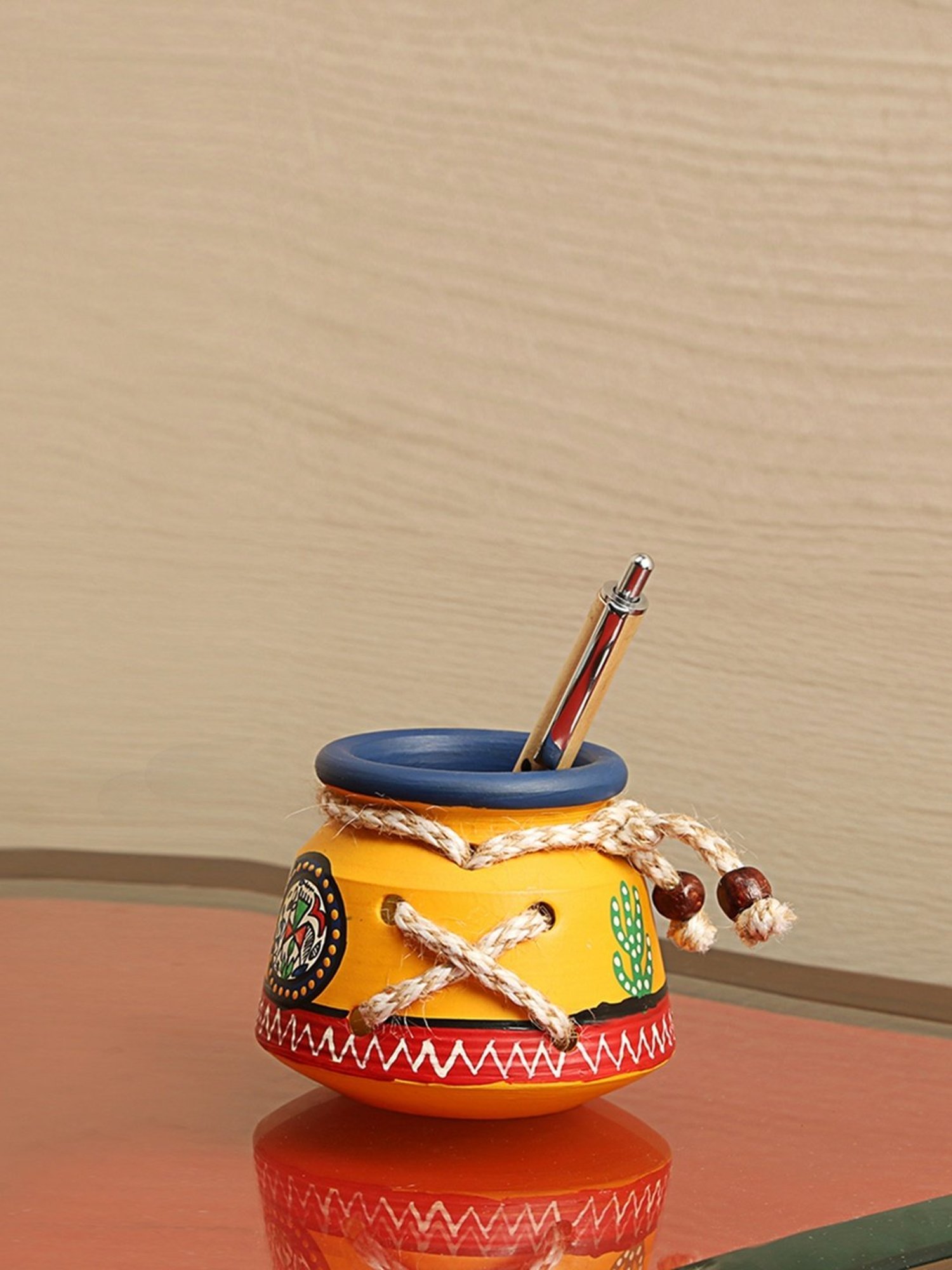 ExclusiveLane Terracotta Warli Handpainted Pen Stand Knitted Yellow