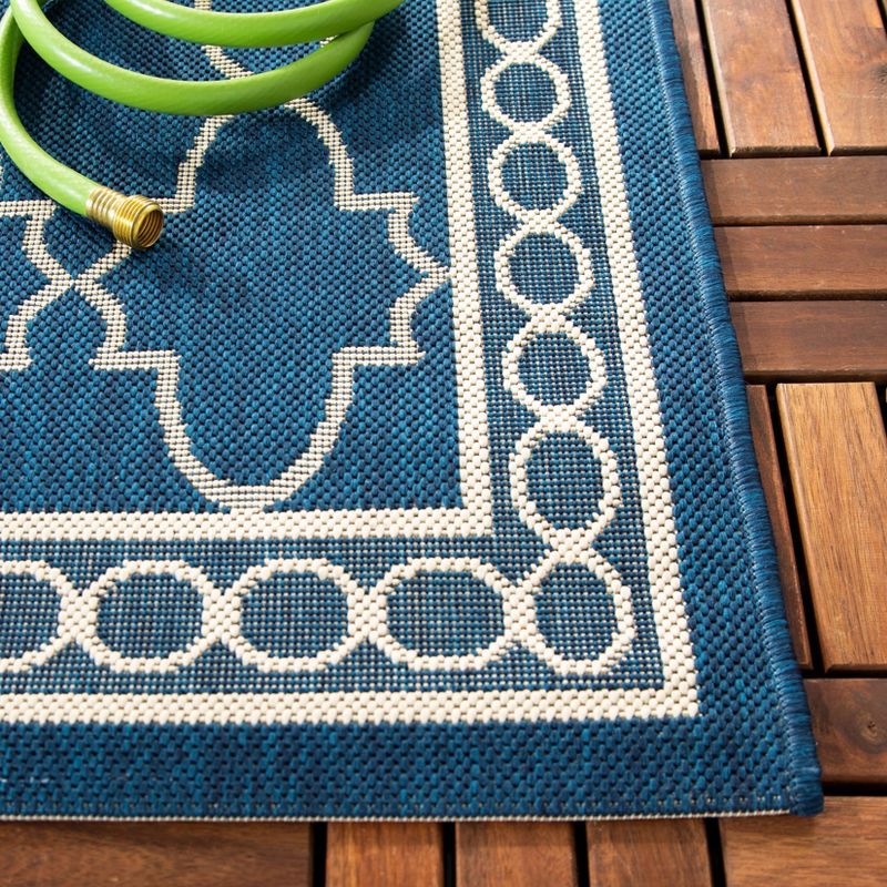 6'7" x 9'6" Gibson Outdoor Rug Navy/Beige - Safavieh
