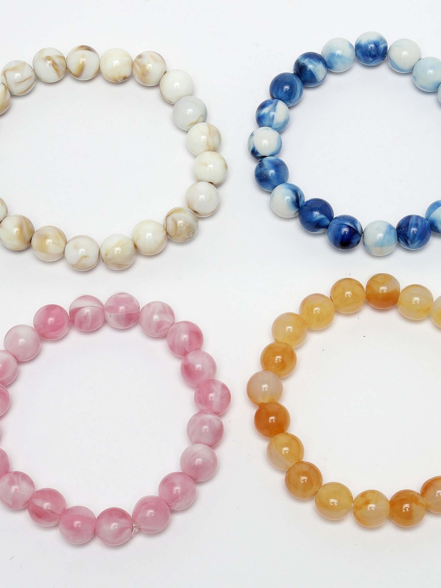 NVR Multicolor Elasticated Rakhi with Roli Chawal - Set of 4