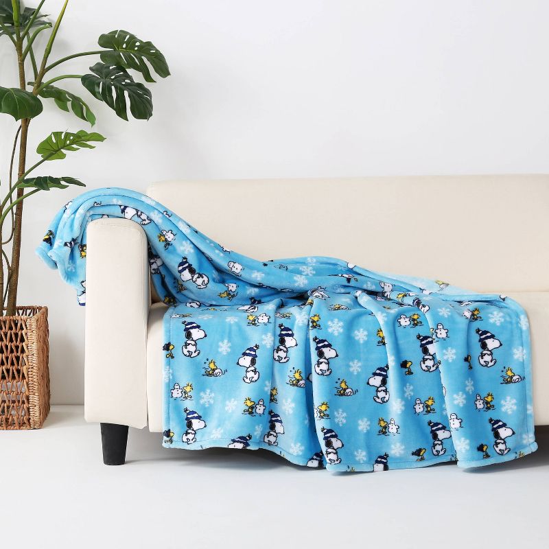 55"x70" Peanuts Snowy Snoopy Throw Blanket - Better Living